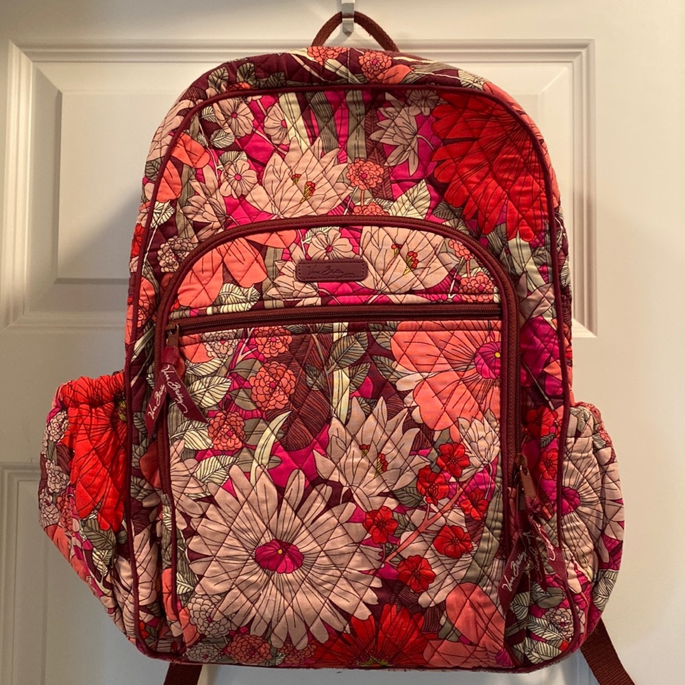 Vera Bradley backpack. Nonsmoking home. Slight staining on bottom right strap.